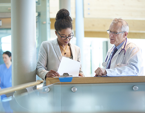 Medical administrators in a discussion